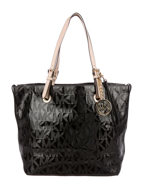 small black michael kors tote with nude straps|michael kors black patent tote.